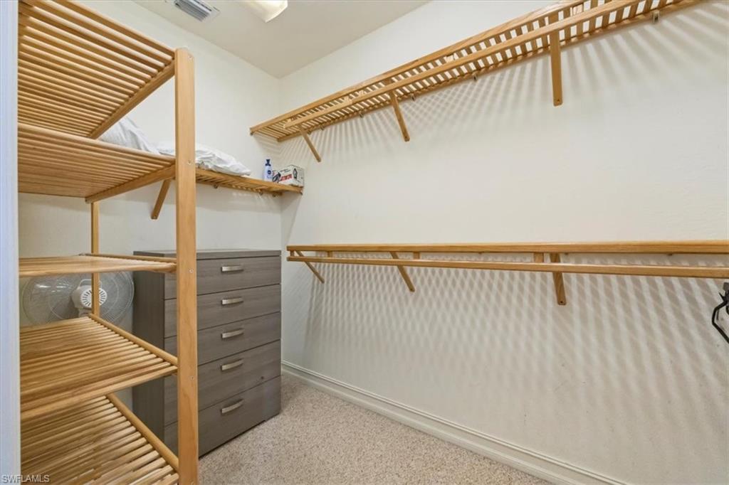 9105 Yuba Lane, Unit 7902 Naples, FL 34113 - Photo 19 of 25 a view of walk in closet