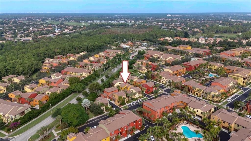 9105 Yuba Lane, Unit 7902 Naples, FL 34113 - Photo 25 of 25 an aerial view of a city with lots of residential buildings
