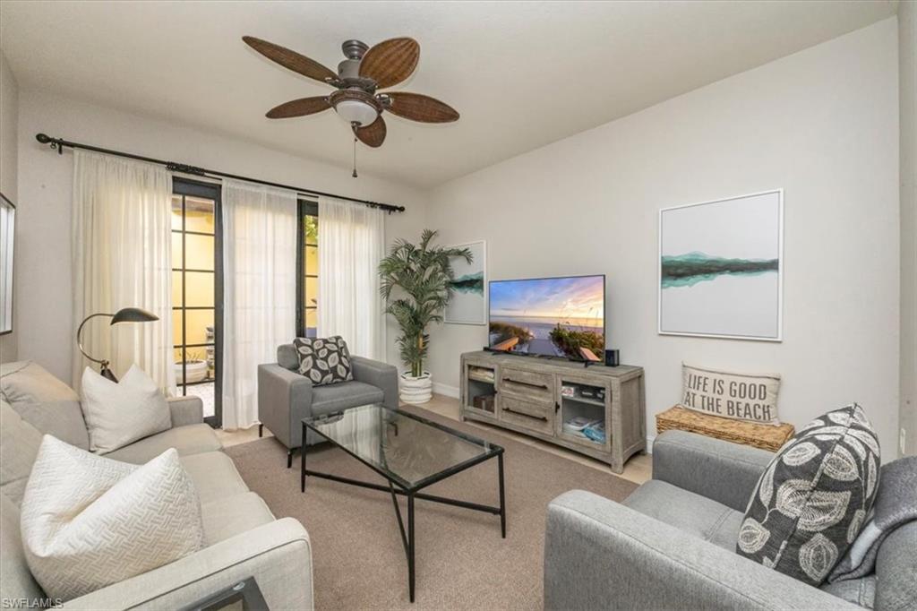 9105 Yuba Lane, Unit 7902 Naples, FL 34113 - Photo 4 of 25 a living room with furniture