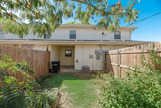 a view of a backyard with plants
