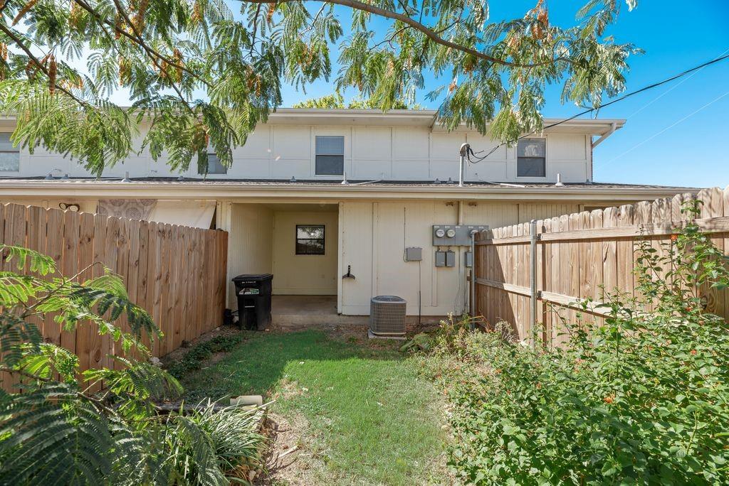 648 South Rogers Road, Unit 650 Irving, TX 75060 - Photo 19 of 21 a view of a backyard with plants