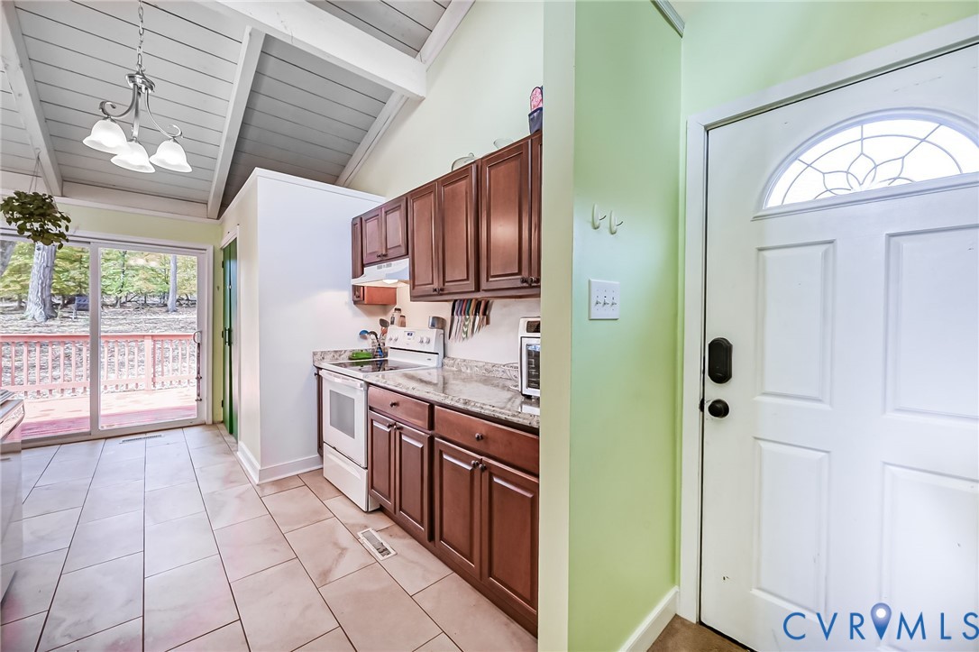 2009 Highland Drive Powhatan, VA 23139 - Photo 4 of 34 Kitchen with tiled flooring and vaulted ceiling