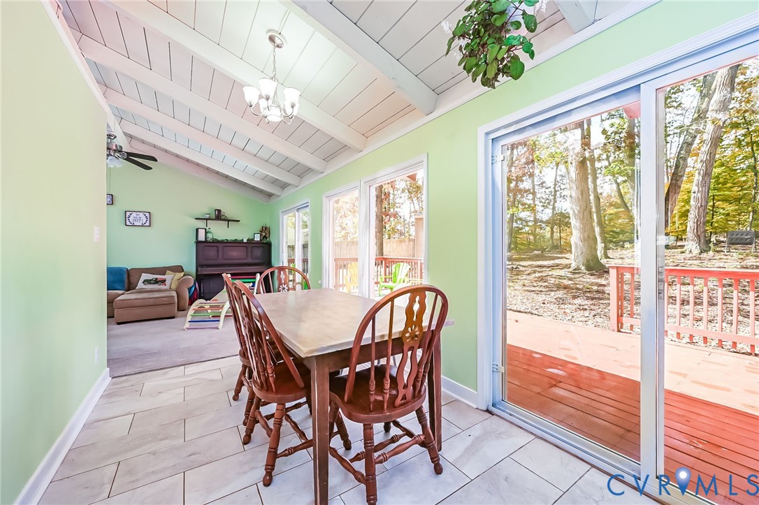 2009 Highland Drive Powhatan, VA 23139 - Photo 8 of 34 Dining area with tiled flooring and vaulted ceilin