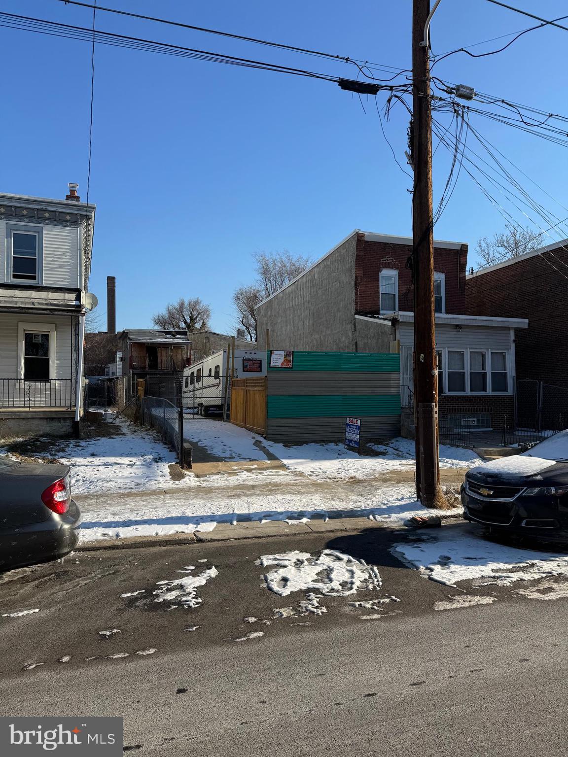 2541 South 71st Street Philadelphia, PA 19142 - Photo 1 of 1 a view of a street with cars