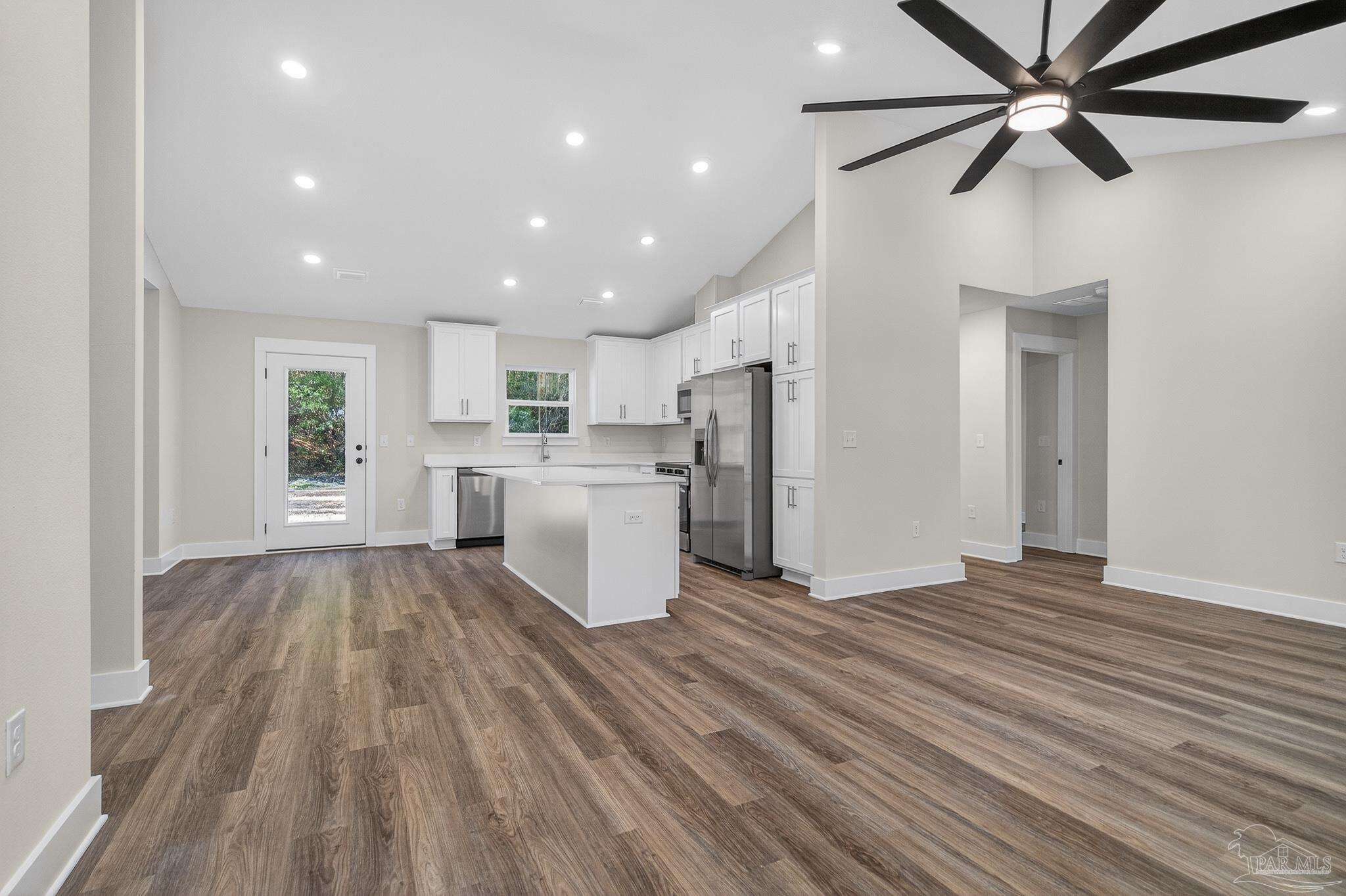 1056 Barth Road Molino, FL 32577 - Photo 23 of 46 a view of a kitchen with stove and cabinets