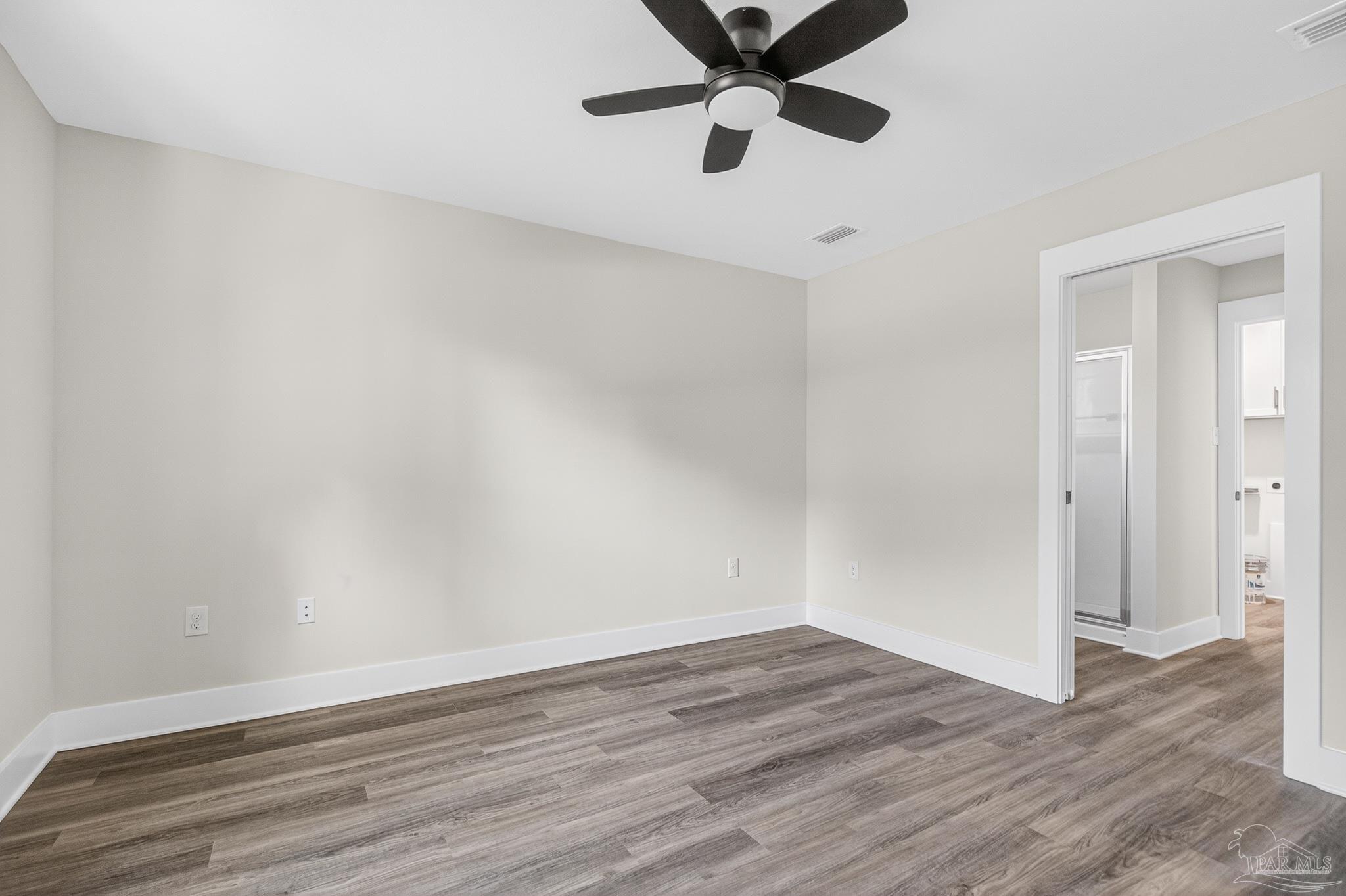 1056 Barth Road Molino, FL 32577 - Photo 26 of 46 wooden floor in an empty room