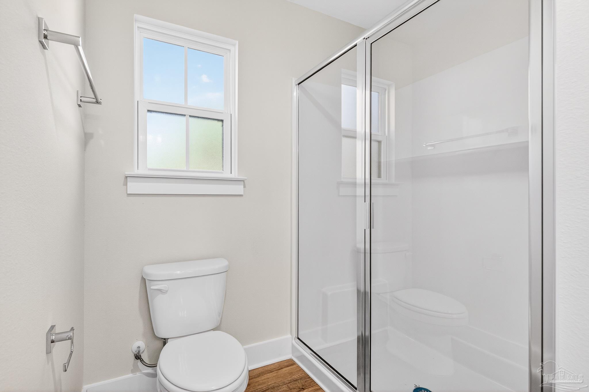1056 Barth Road Molino, FL 32577 - Photo 28 of 46 a bathroom with a toilet and a shower