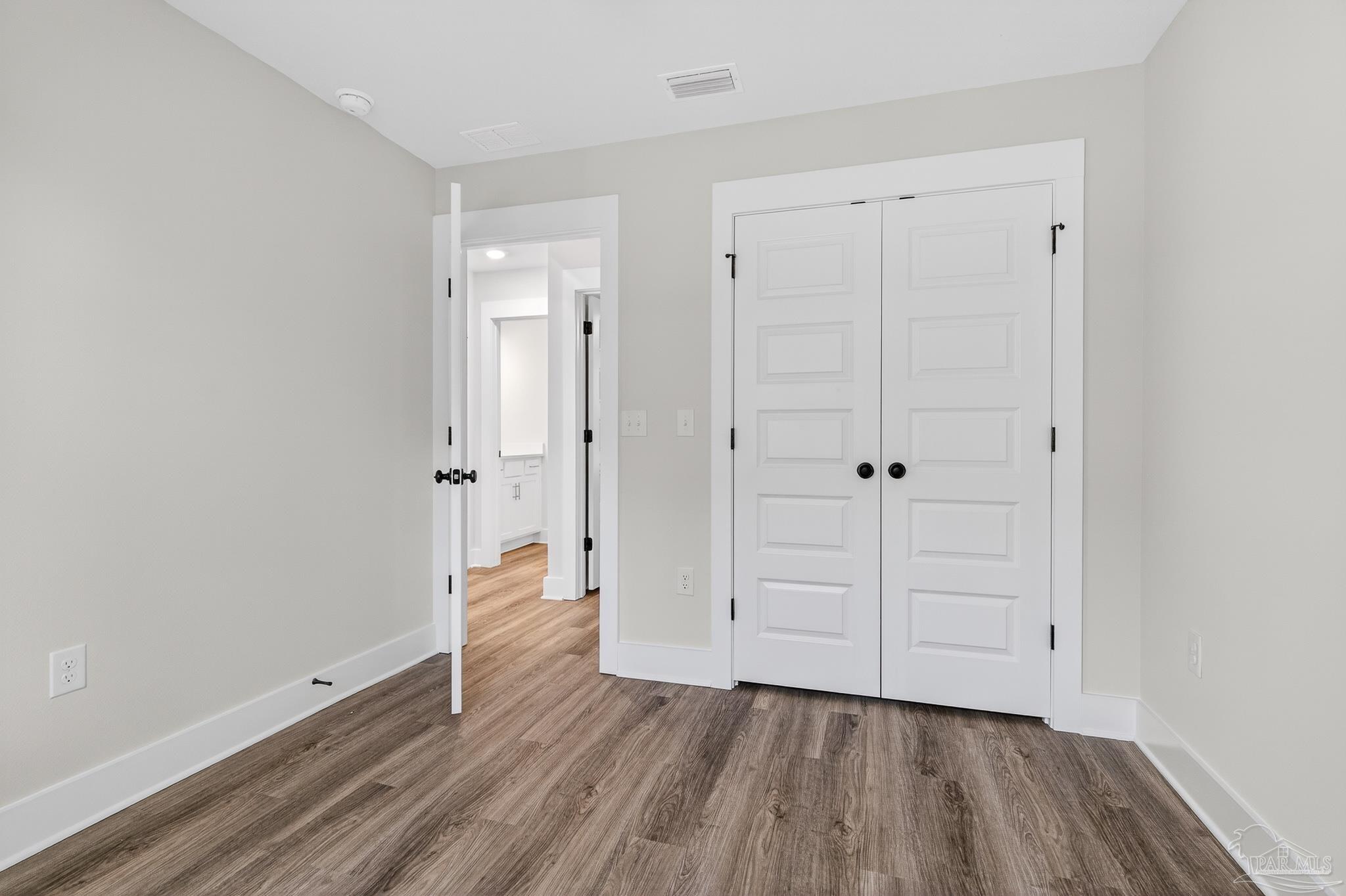 1056 Barth Road Molino, FL 32577 - Photo 37 of 46 wooden floor in an empty room