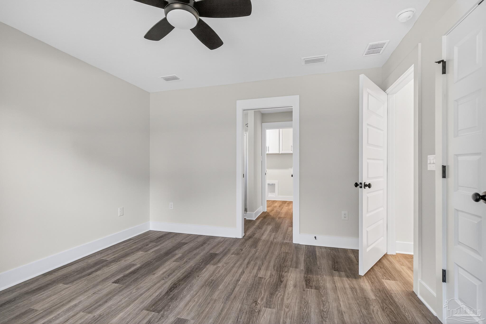 1056 Barth Road Molino, FL 32577 - Photo 42 of 46 a view of empty room with wooden floor