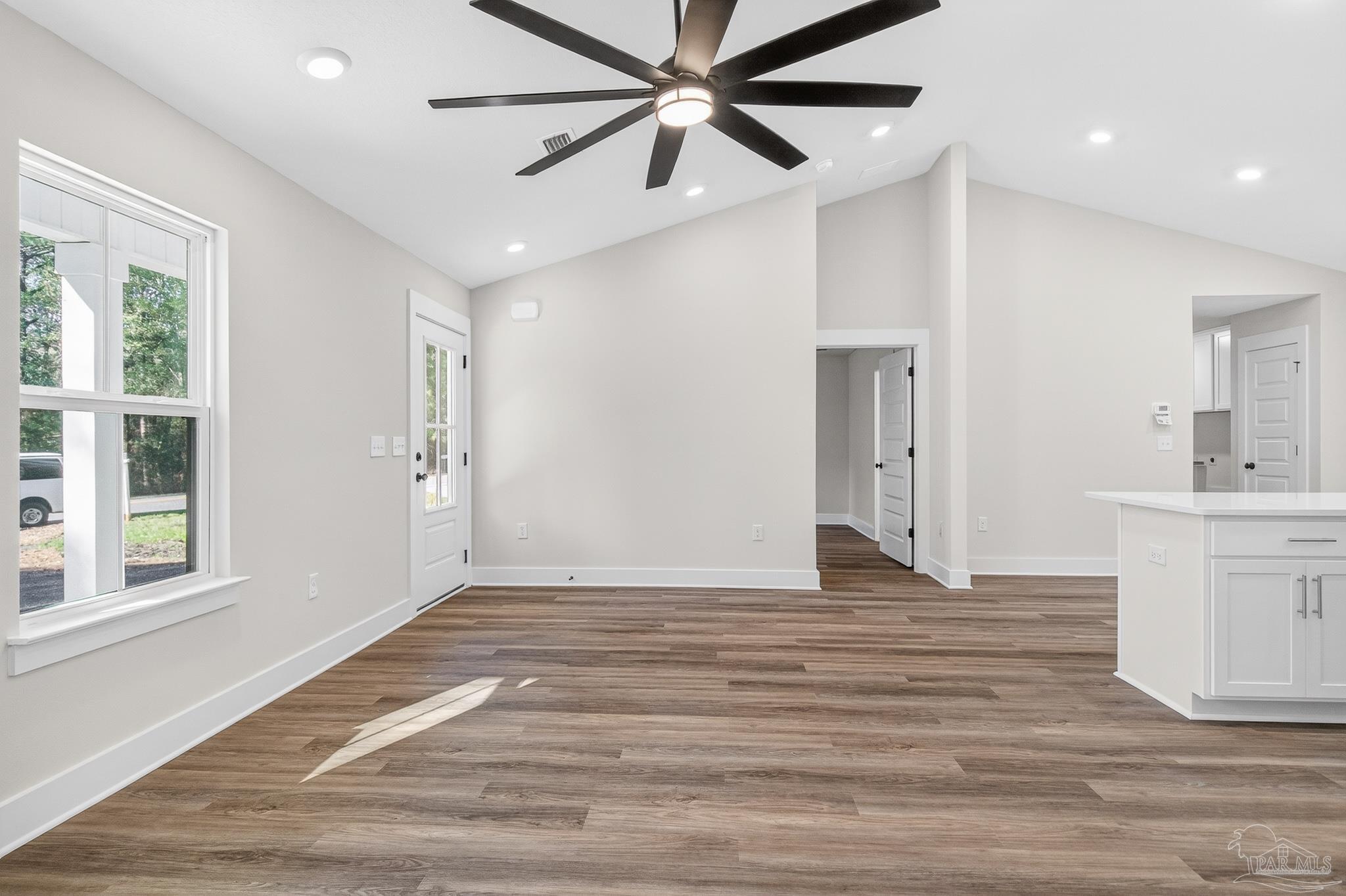 1056 Barth Road Molino, FL 32577 - Photo 43 of 46 a view of empty room with wooden floor and fan