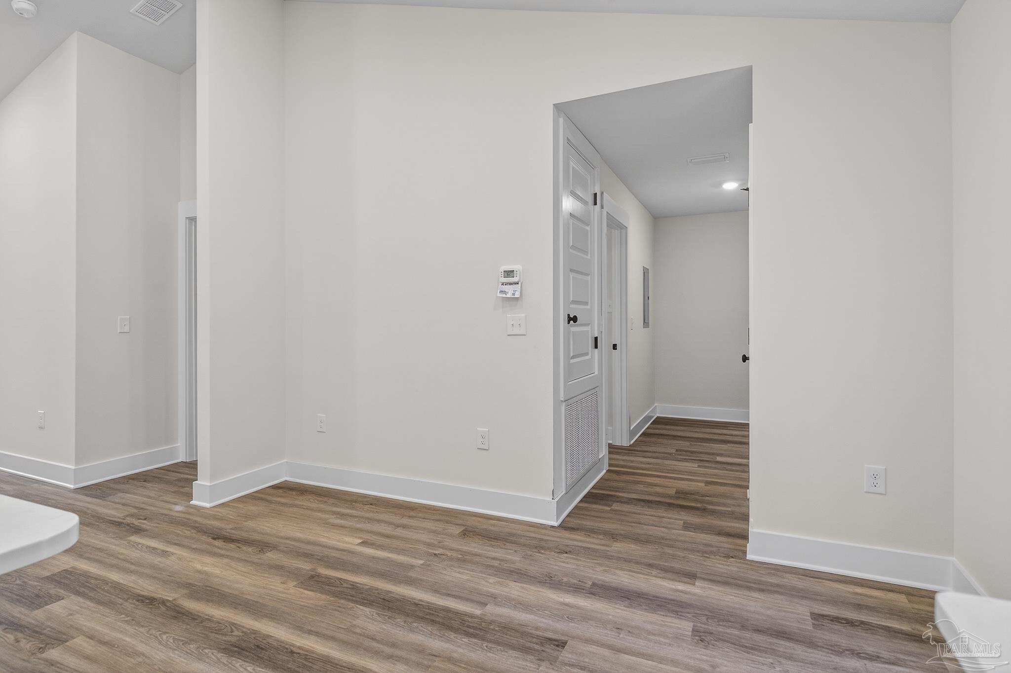1056 Barth Road Molino, FL 32577 - Photo 5 of 46 a view of a hallway with wooden floor