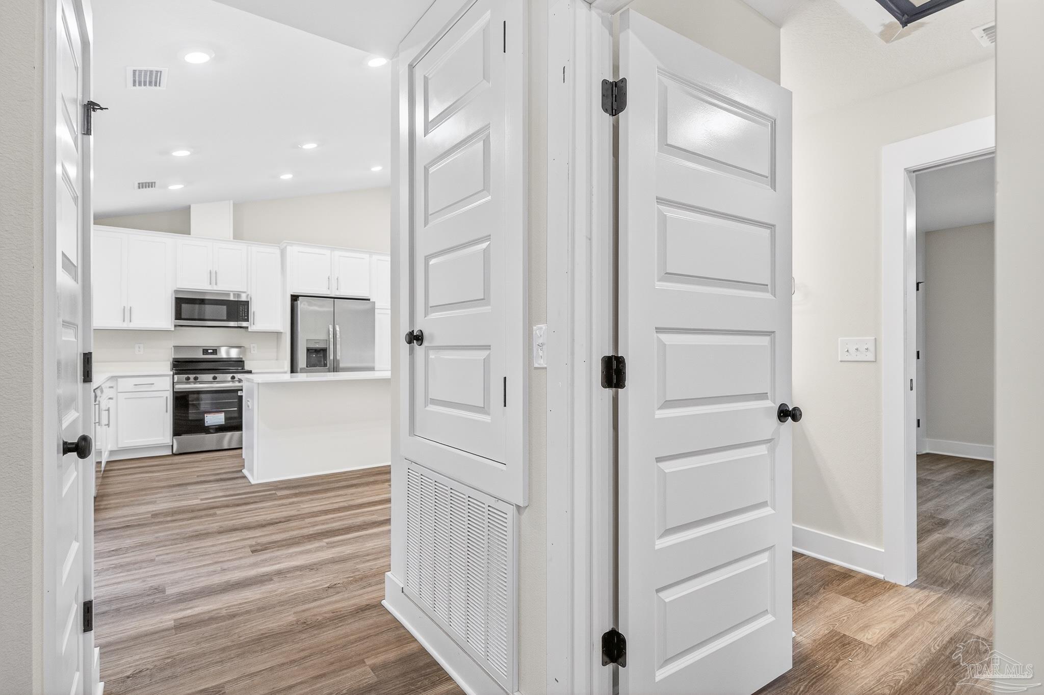 1056 Barth Road Molino, FL 32577 - Photo 8 of 46 a view of kitchen with wooden floor