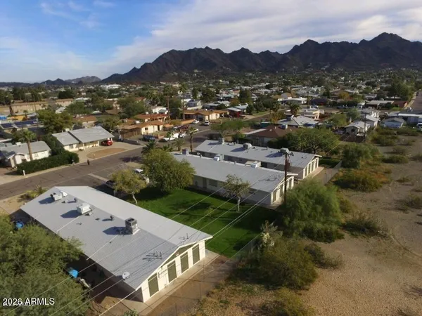 an aerial view of residential house with outdoor space
