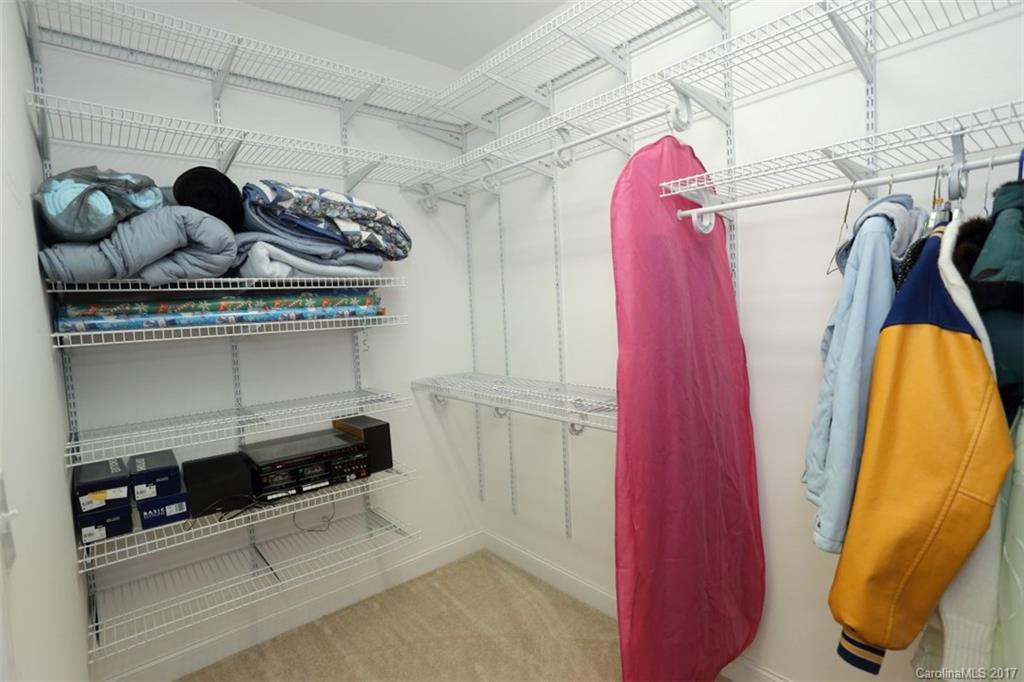 9805 Vineyard Road Mount Pleasant, NC 28124 - Photo 12 of 24 a close view of walk in closet