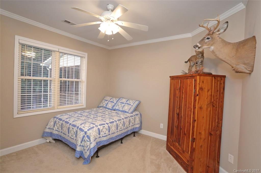 9805 Vineyard Road Mount Pleasant, NC 28124 - Photo 14 of 24 a bedroom with a bed and a window