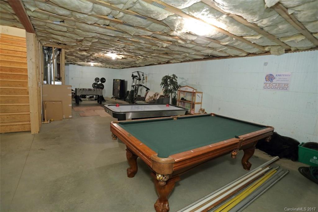 9805 Vineyard Road Mount Pleasant, NC 28124 - Photo 17 of 24 a room with pool table and windows