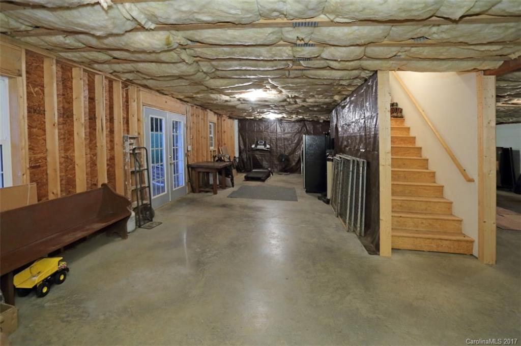 9805 Vineyard Road Mount Pleasant, NC 28124 - Photo 18 of 24 a view of hallway with stairs