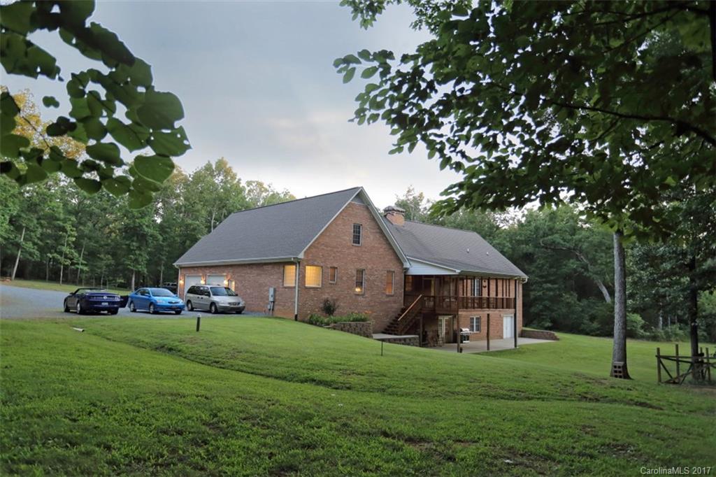 9805 Vineyard Road Mount Pleasant, NC 28124 - Photo 19 of 24 a front view of house with yard and green space
