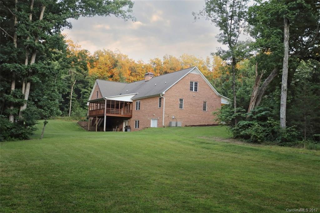 9805 Vineyard Road Mount Pleasant, NC 28124 - Photo 20 of 24 a view of a house with backyard and garden