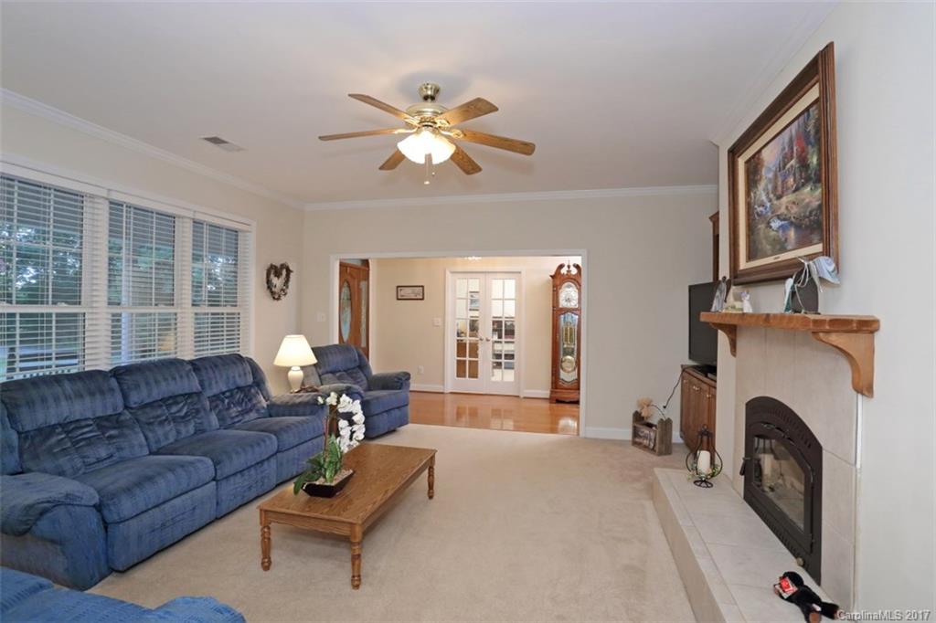 9805 Vineyard Road Mount Pleasant, NC 28124 - Photo 4 of 24 a living room with furniture and a fireplace