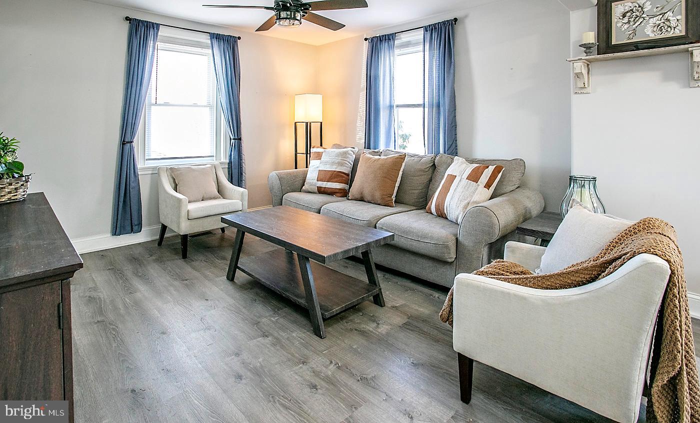 2817 Egypt Road Audubon, PA 19403 - Photo 12 of 25 a living room with furniture and a window