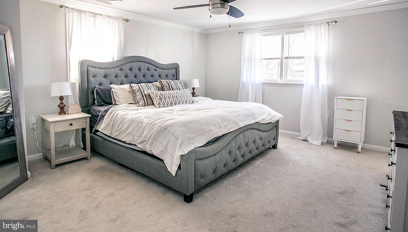 2817 Egypt Road Audubon, PA 19403 - Photo 15 of 25 a bed sitting in a bedroom next to a window