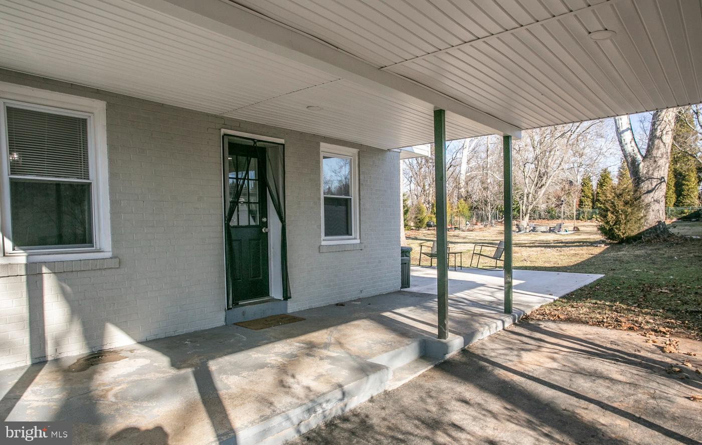 2817 Egypt Road Audubon, PA 19403 - Photo 22 of 25 a view of a bedroom with wooden floor and iron stairs
