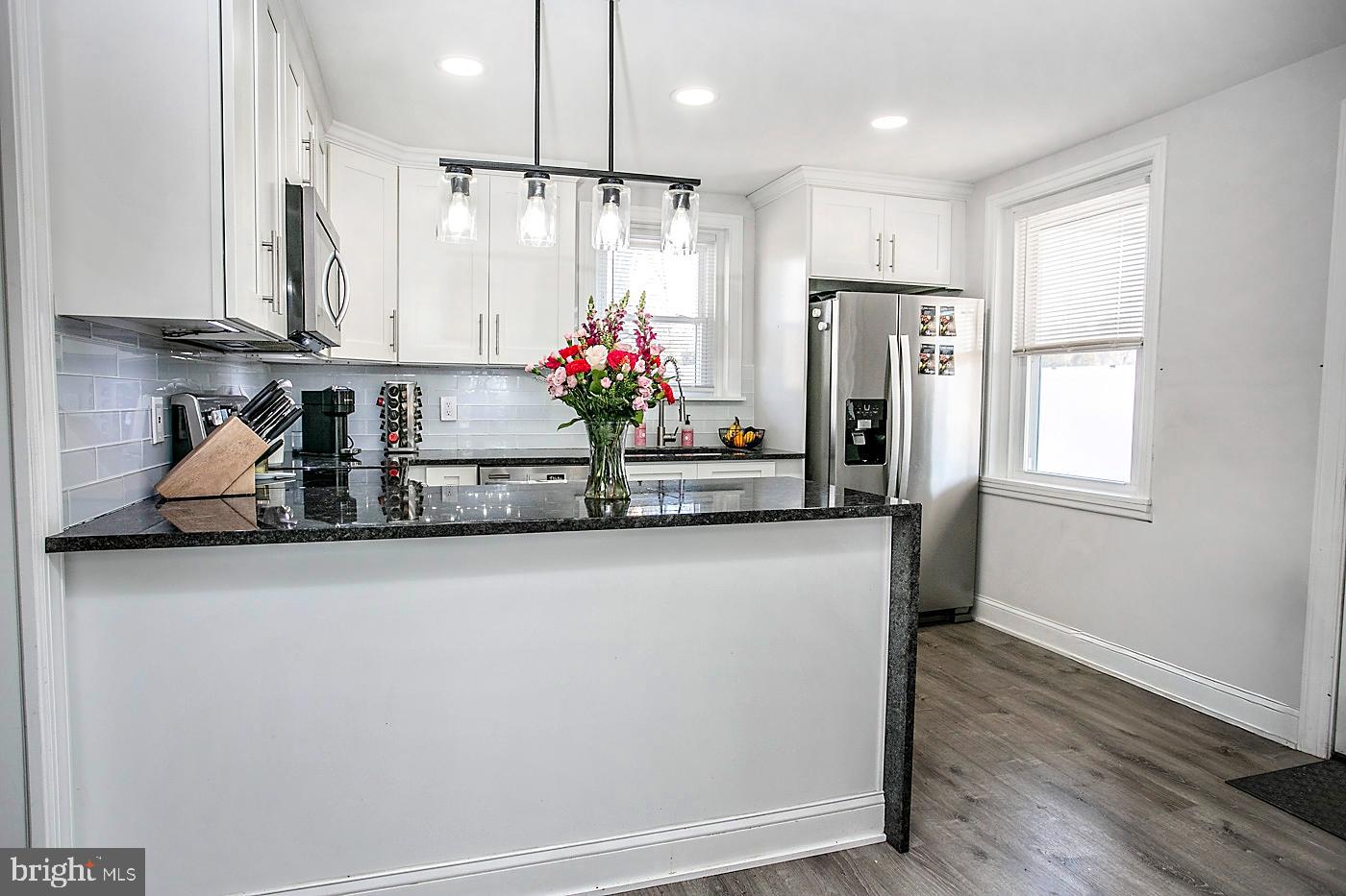 2817 Egypt Road Audubon, PA 19403 - Photo 8 of 25 a kitchen with stainless steel appliances granite countertop a refrigerator and a sink