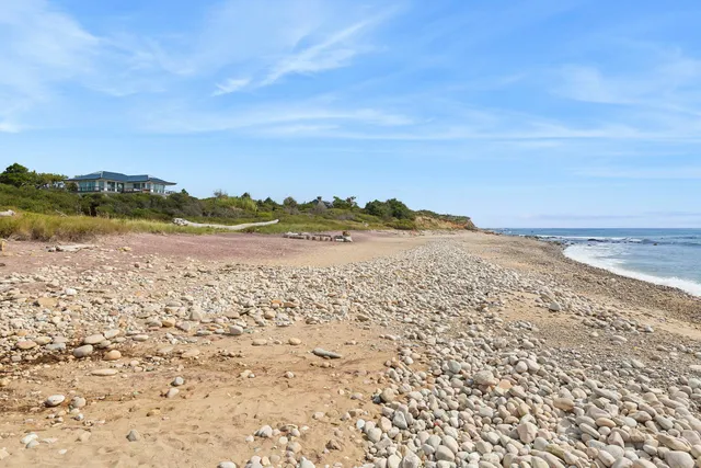 an aerial view of beach and city