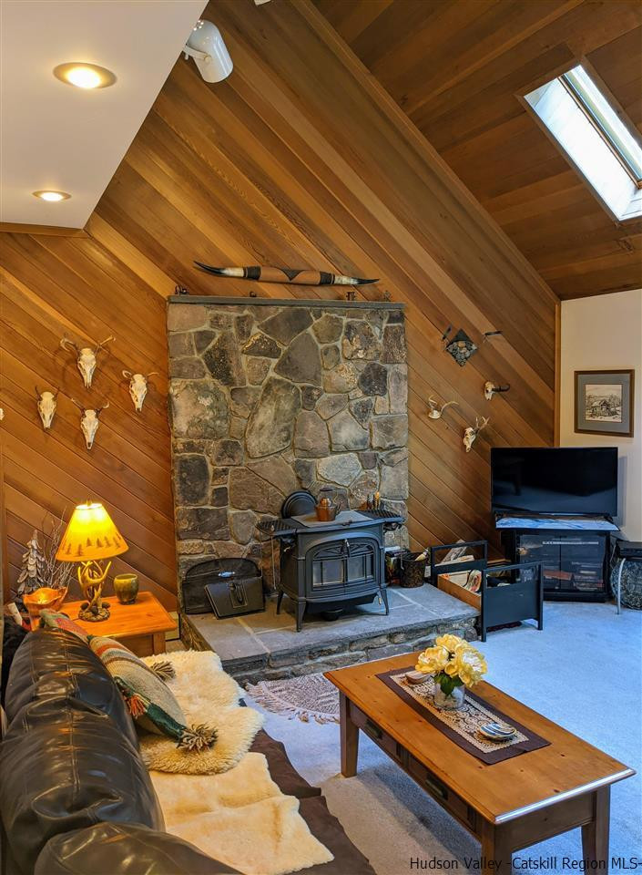 118 Rudy Frank Road Shandaken, NY 12480 - Photo 5 of 35 a living room with furniture a pool table and a fireplace