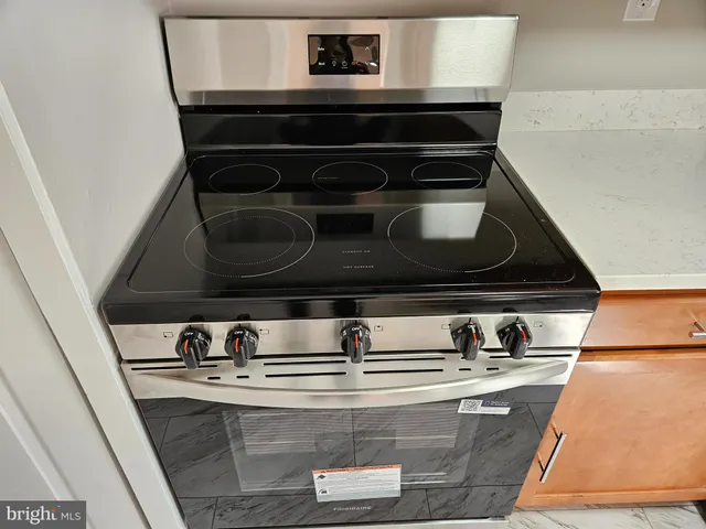 a kitchen with a stove and a microwave