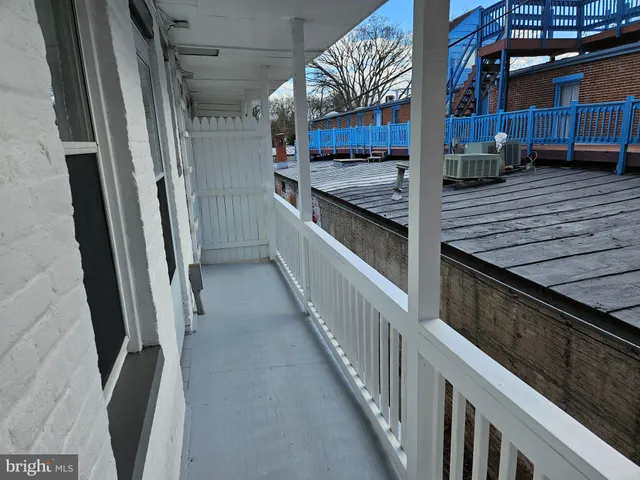 a bathroom with a sink a mirror and vanity