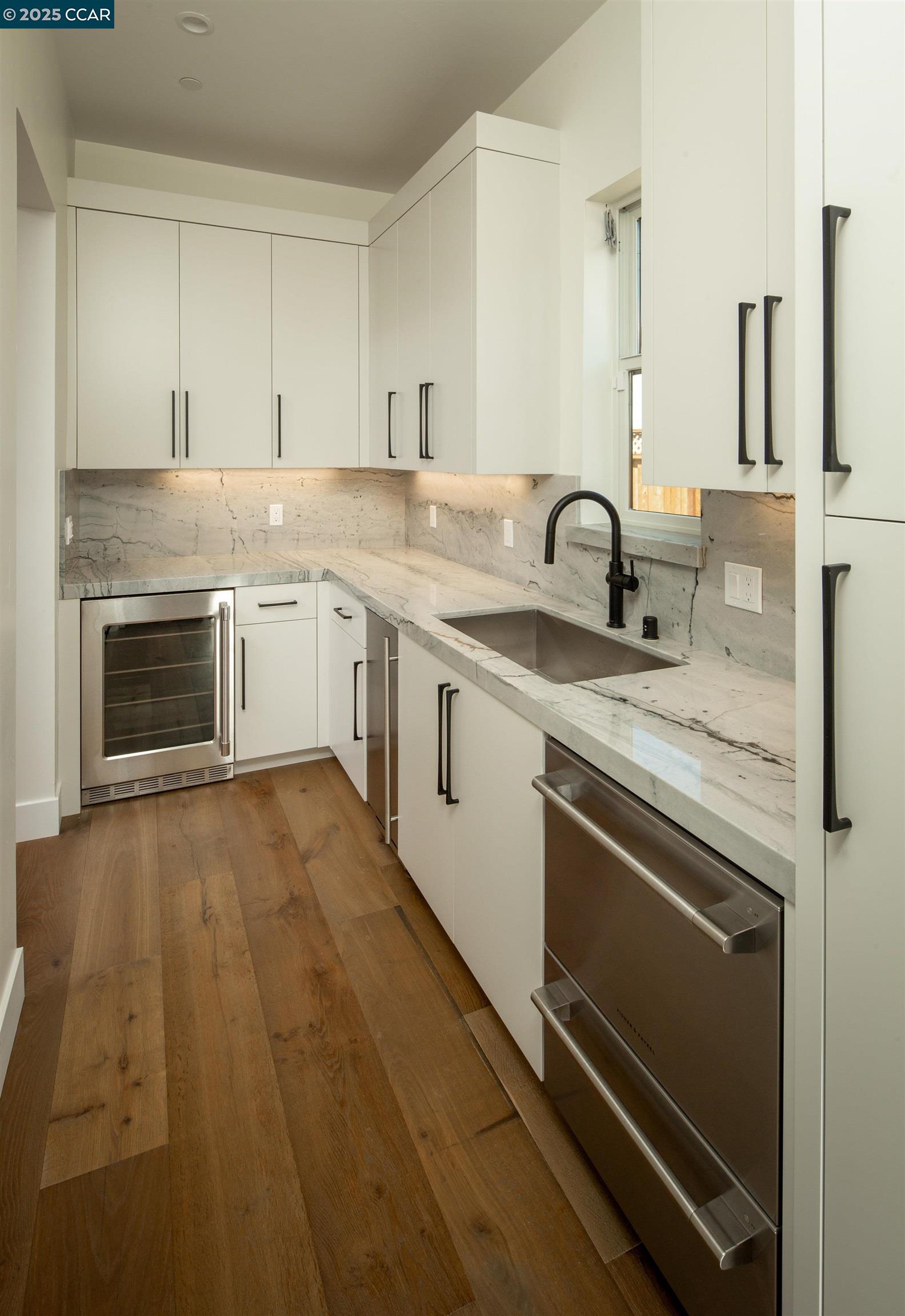 1070 Borrette Lane Napa, CA 94558 - Photo 12 of 28 a view of a kitchen with sink stove and cabinets
