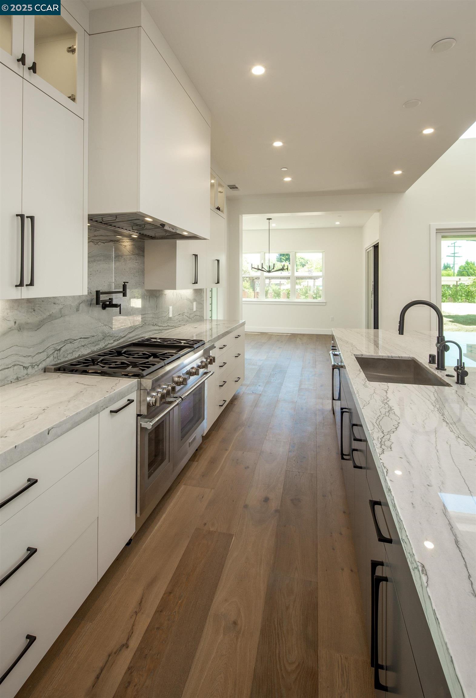 1070 Borrette Lane Napa, CA 94558 - Photo 14 of 28 a kitchen with granite countertop a stove and a sink