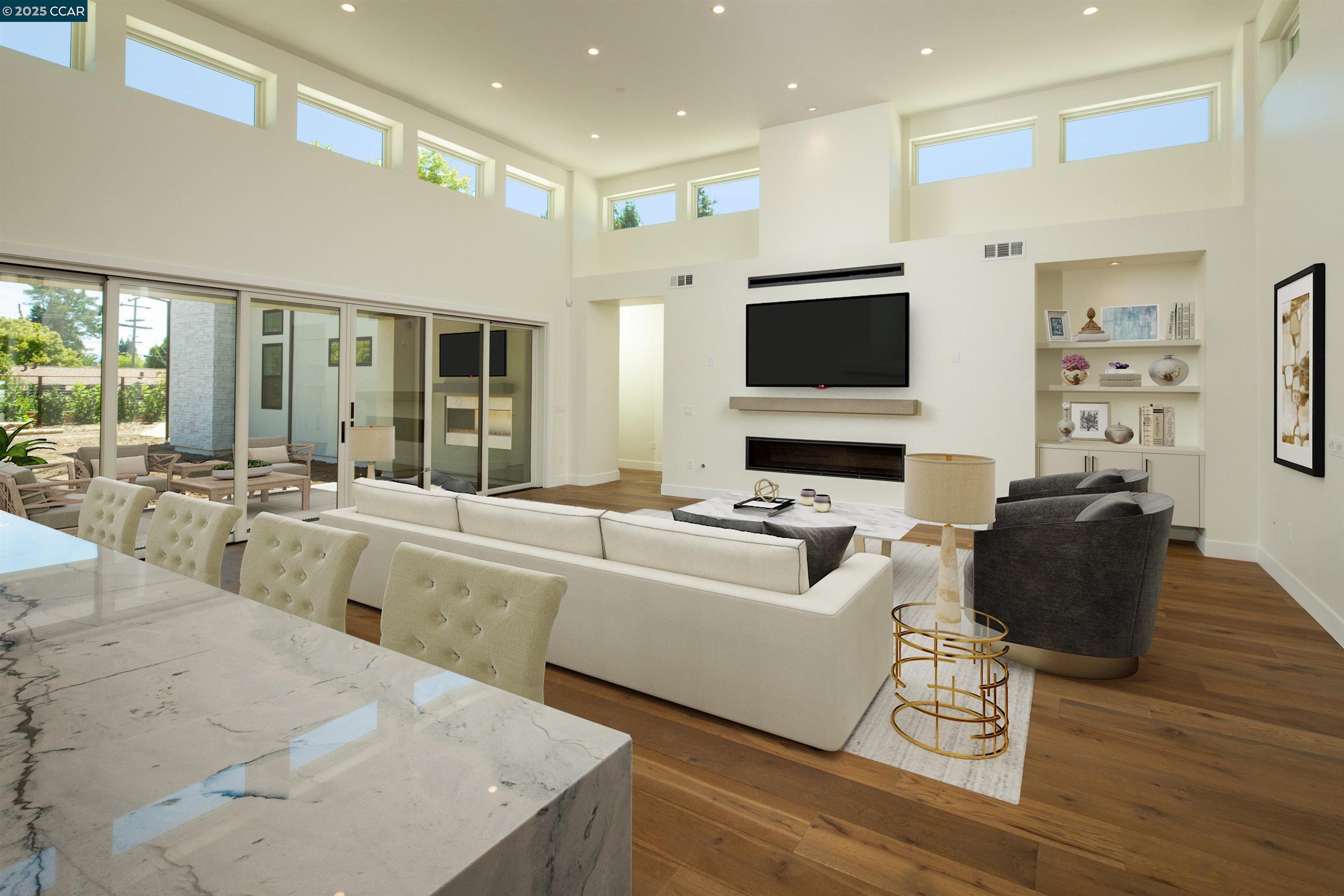 1070 Borrette Lane Napa, CA 94558 - Photo 7 of 28 a living room with furniture and a flat screen tv