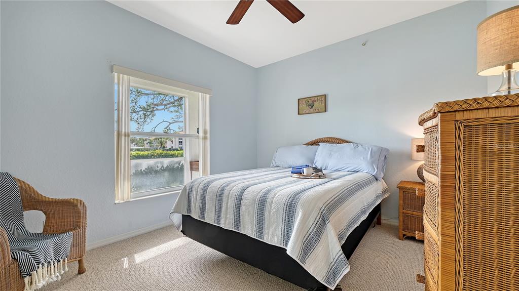 6556 Fairway Gardens Drive Bradenton, FL 34203 - Photo 17 of 43 a bedroom with a bed and a window