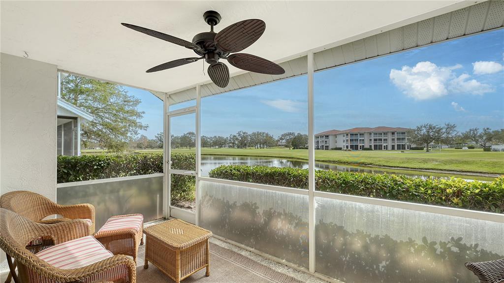 6556 Fairway Gardens Drive Bradenton, FL 34203 - Photo 20 of 43 a view of a chair and tables in the balcony