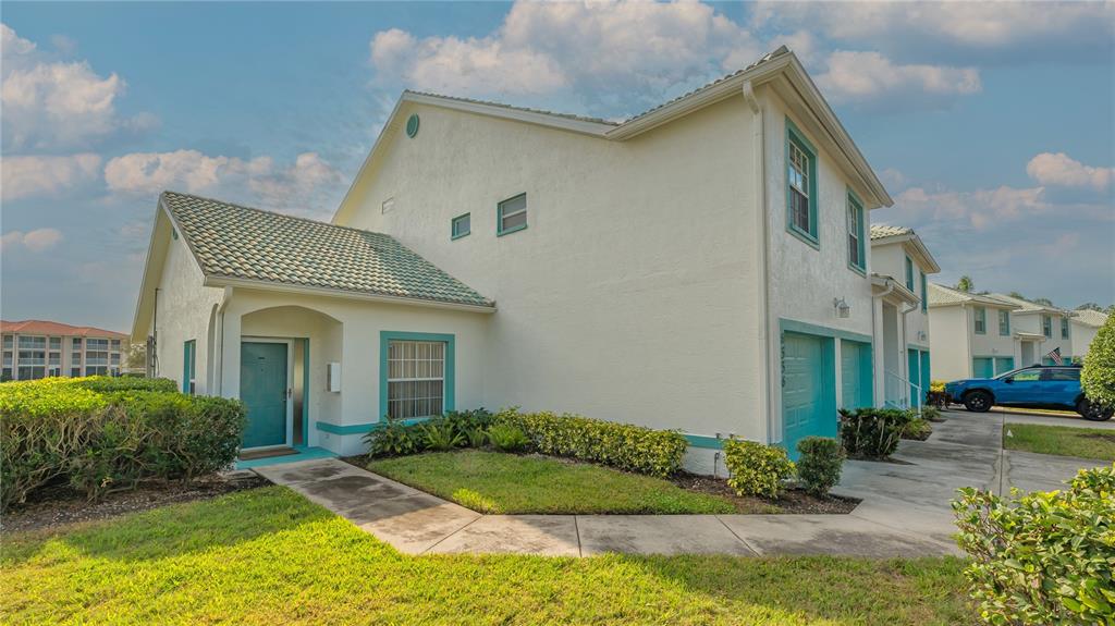 6556 Fairway Gardens Drive Bradenton, FL 34203 - Photo 2 of 43 a view of a house with a patio