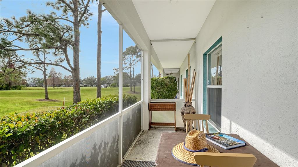 6556 Fairway Gardens Drive Bradenton, FL 34203 - Photo 21 of 43 a room with furniture and a large window