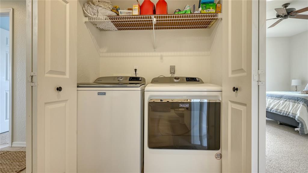 6556 Fairway Gardens Drive Bradenton, FL 34203 - Photo 23 of 43 a utility room with dryer and washer