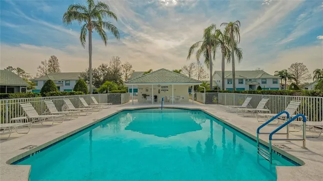 a view of a house with a swimming pool