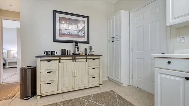 a bathroom with a double vanity sink a mirror and a shower
