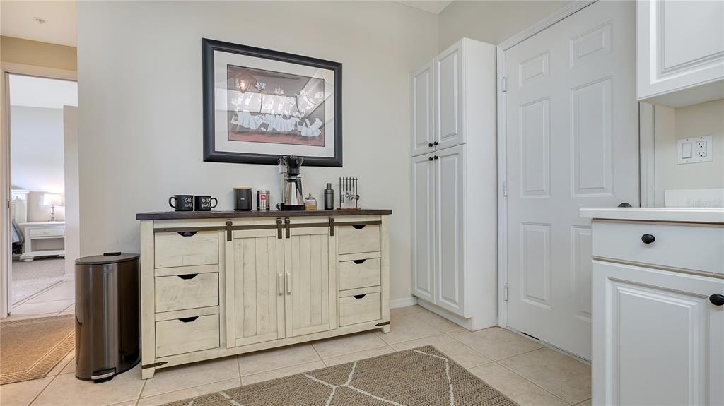 6556 Fairway Gardens Drive Bradenton, FL 34203 - Photo 10 of 43 a bathroom with a double vanity sink a mirror and a shower