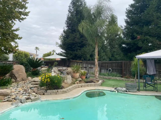 a garden view with a seating space