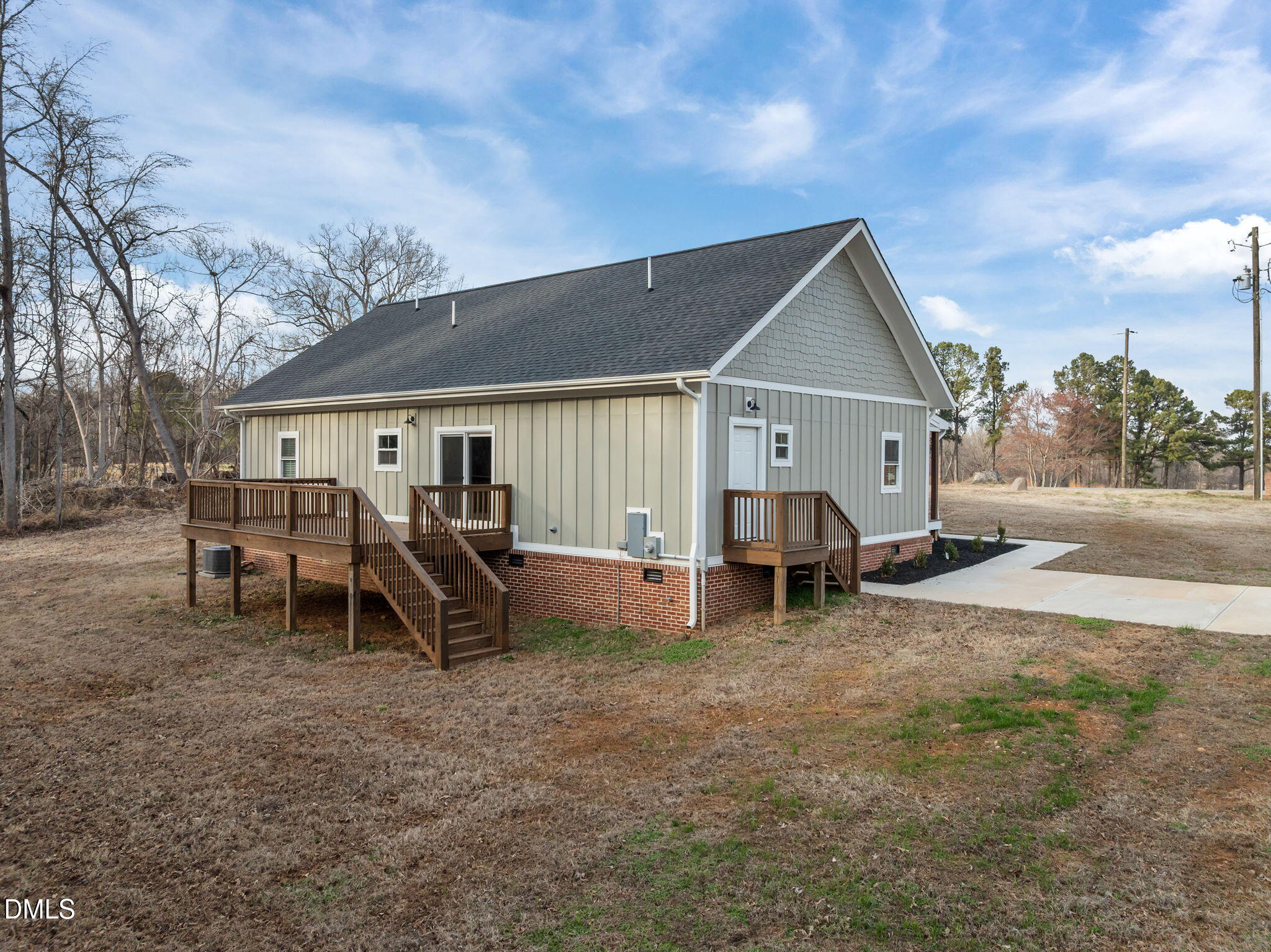 193 Community House Road, Unit A47 266 Roxboro, NC 27574 - Photo 13 of 55 a view of a house with a yard and sitting area
