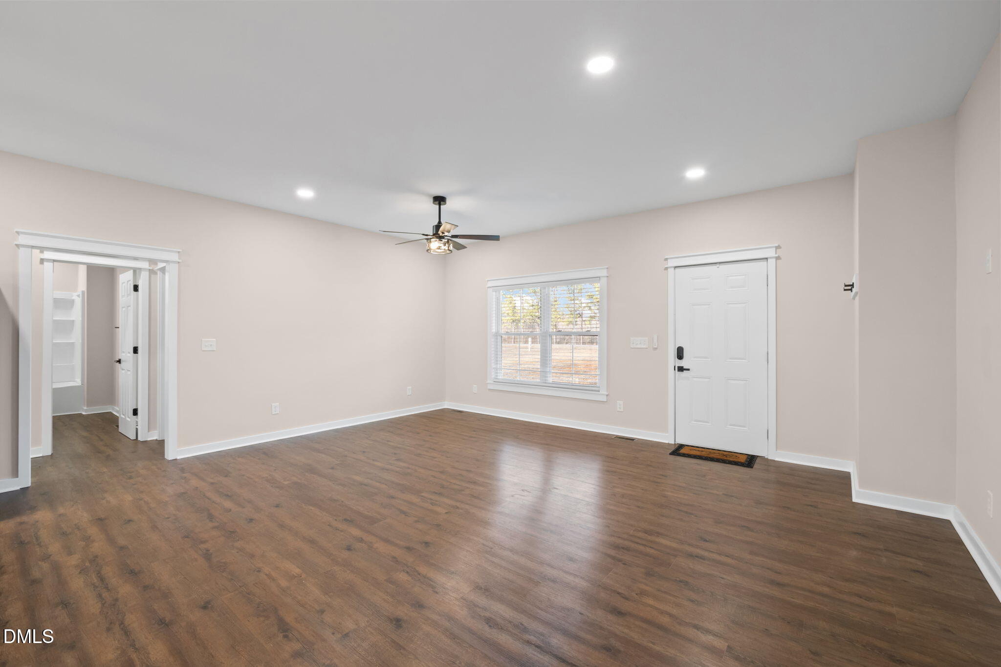 193 Community House Road, Unit A47 266 Roxboro, NC 27574 - Photo 27 of 55 wooden floor in an empty room with a window