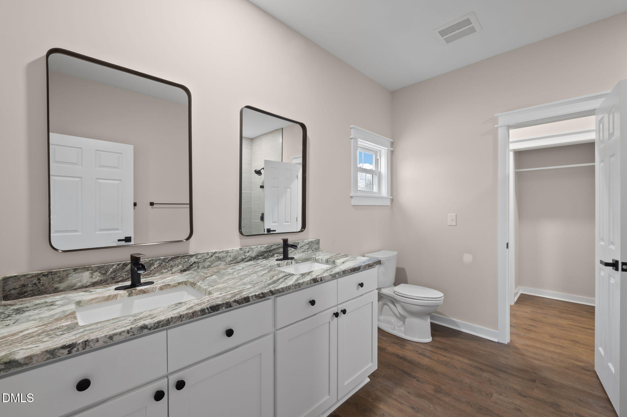 193 Community House Road, Unit A47 266 Roxboro, NC 27574 - Photo 47 of 55 a bathroom with a granite countertop sink mirror and toilet