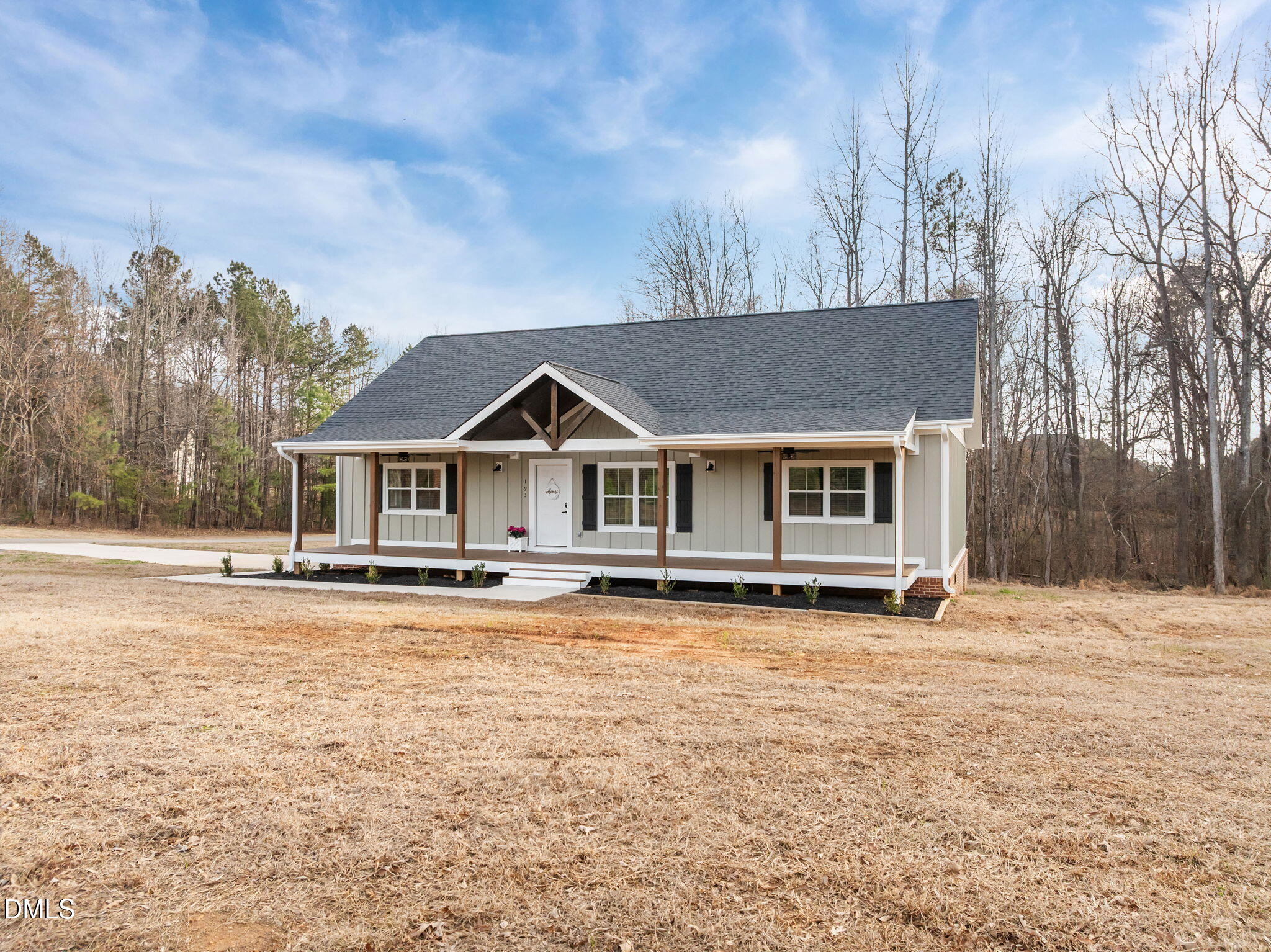 193 Community House Road, Unit A47 266 Roxboro, NC 27574 - Photo 5 of 55 a front view of a house with a yard
