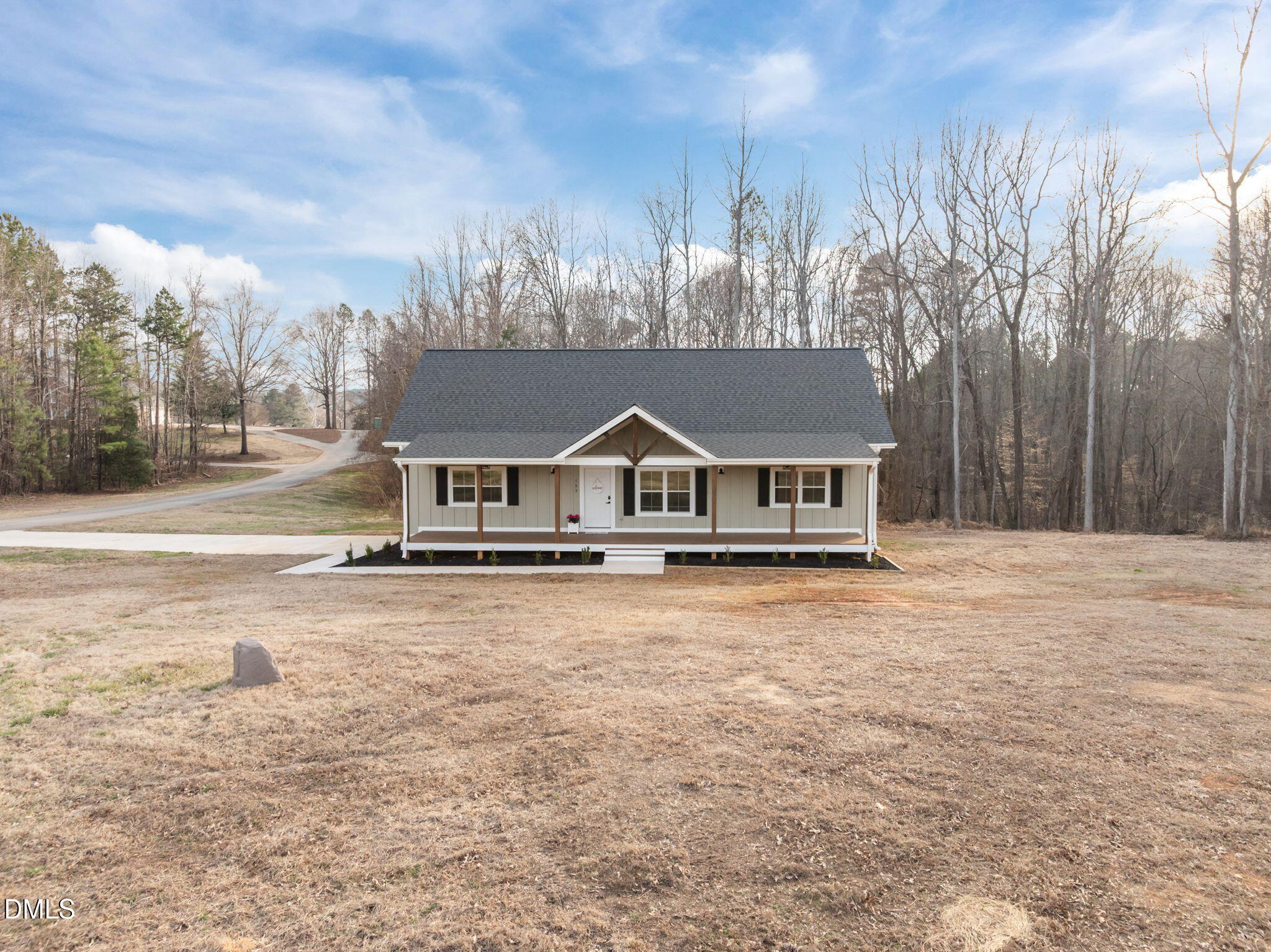 193 Community House Road, Unit A47 266 Roxboro, NC 27574 - Photo 8 of 55 a house with trees in the background