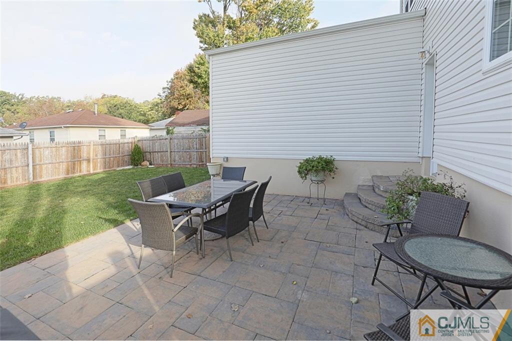 28 Fox Road Edison, NJ 08817 - Photo 22 of 25 a view of a backyard with furniture and garden